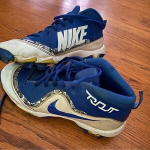 Blue Nike baseball cleats